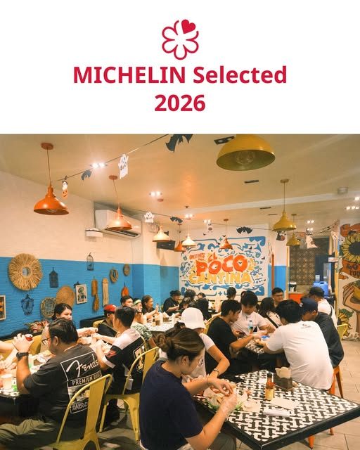 Inside El Poco Cantina with its colorful wall and Michelin recognition